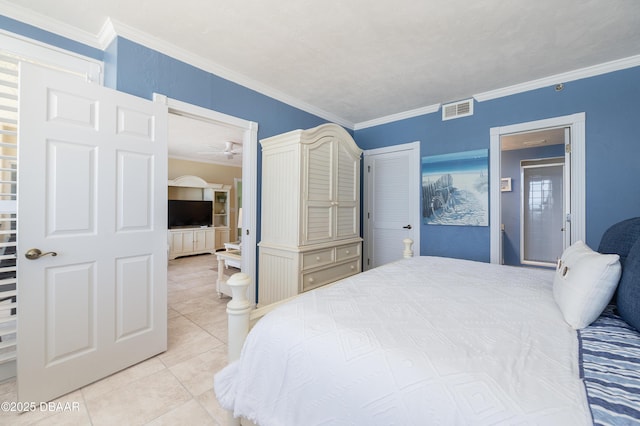 4545 S Atlantic Ave Unit 3704, Ponce Inlet, FL 32127 - bedroom with crown molding, light tile patterned flooring, a closet, and visible vents