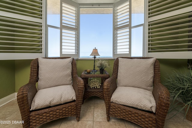 4545 S Atlantic Ave Unit 3704, Ponce Inlet, FL 32127 - living area featuring tile patterned flooring and baseboards
