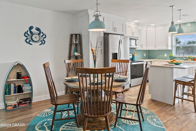 dining room featuring light hardwood / wood-style floors