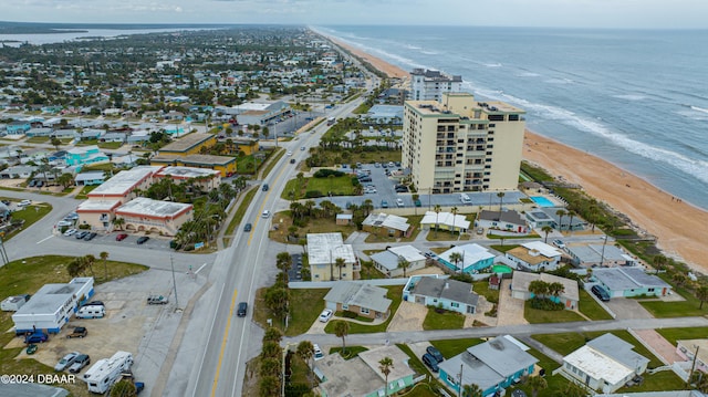 bird's eye view with a view of the beach and a water view