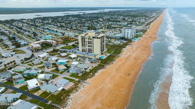 aerial view with a beach view and a water view