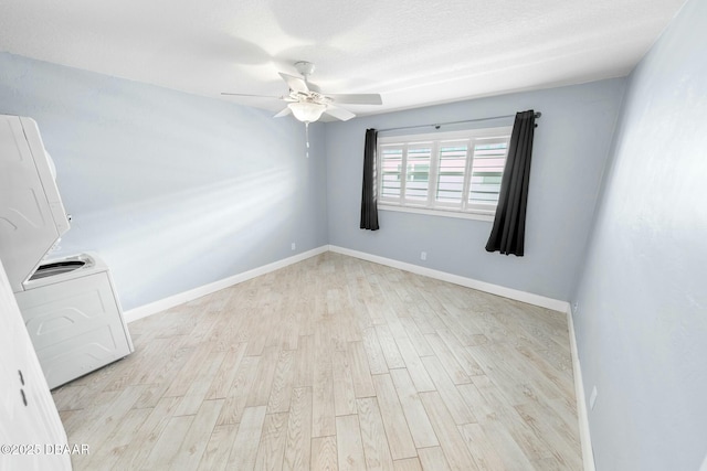 unfurnished room featuring ceiling fan and light wood-type flooring