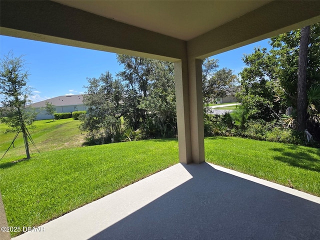 2798 Portadown St, Ormond Beach, FL 32174 - view of grassy yard featuring a patio
