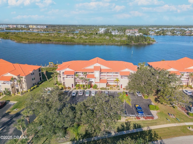 460 Bouchelle Dr Unit 104, New Smyrna Beach, FL 32169 - drone / aerial view featuring a water view