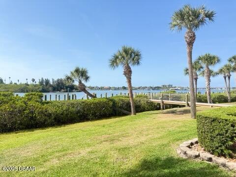 460 Bouchelle Dr Unit 104, New Smyrna Beach, FL 32169 - view of yard with a water view