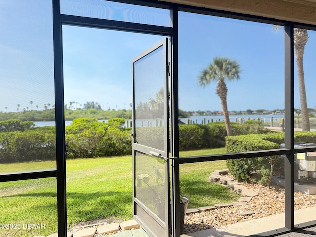 460 Bouchelle Dr Unit 104, New Smyrna Beach, FL 32169 - unfurnished sunroom with a water view