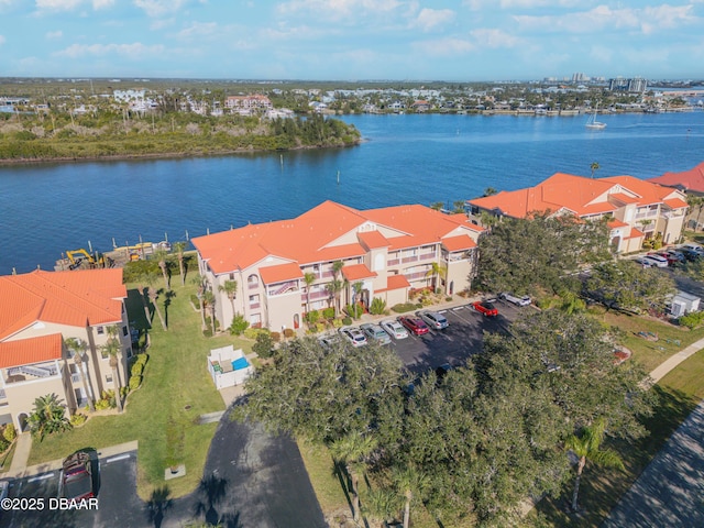 460 Bouchelle Dr Unit 104, New Smyrna Beach, FL 32169 - drone / aerial view with a water view