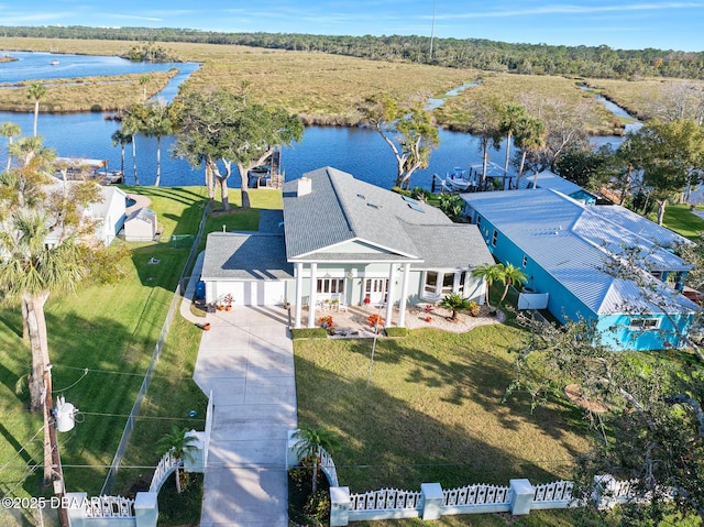 drone / aerial view with a water view