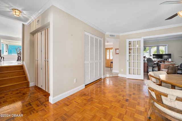 corridor featuring parquet floors and crown molding