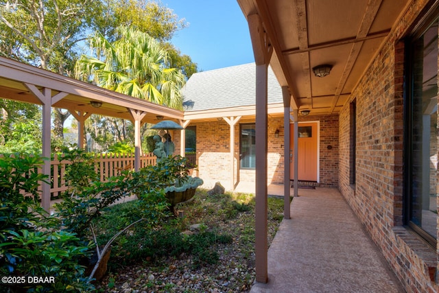 view of patio / terrace featuring fence