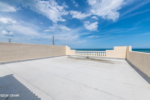 view of patio featuring a water view