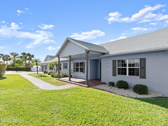 exterior space featuring a front yard