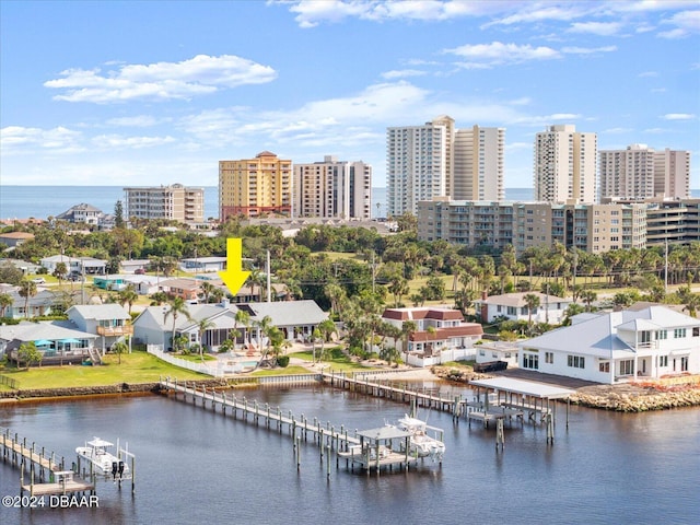 drone / aerial view with a water view