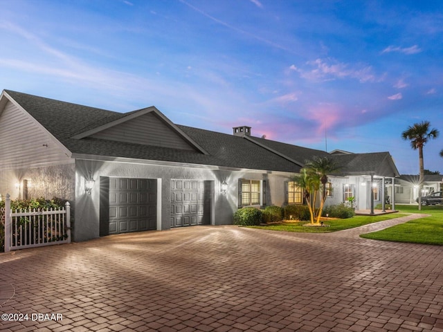 ranch-style house with a garage