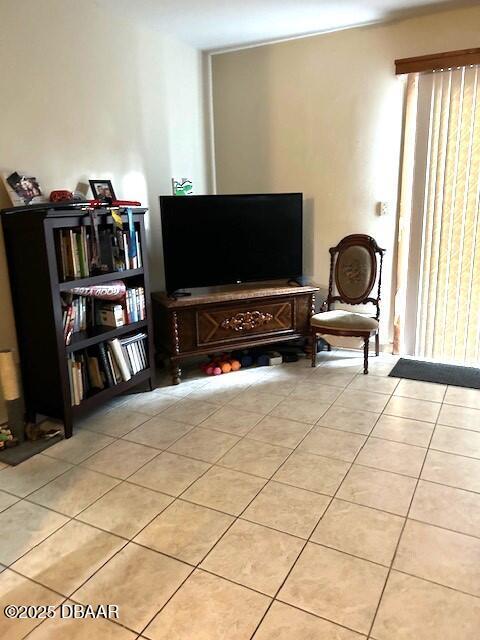 living area featuring light tile patterned floors