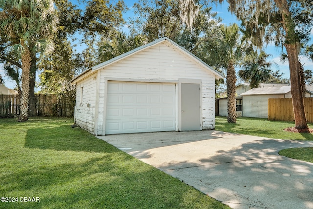 garage with a yard