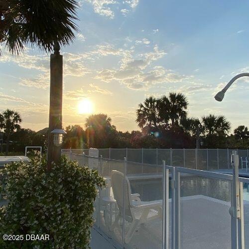 view of pool with fence