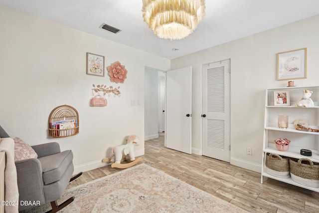 living area featuring light hardwood / wood-style floors