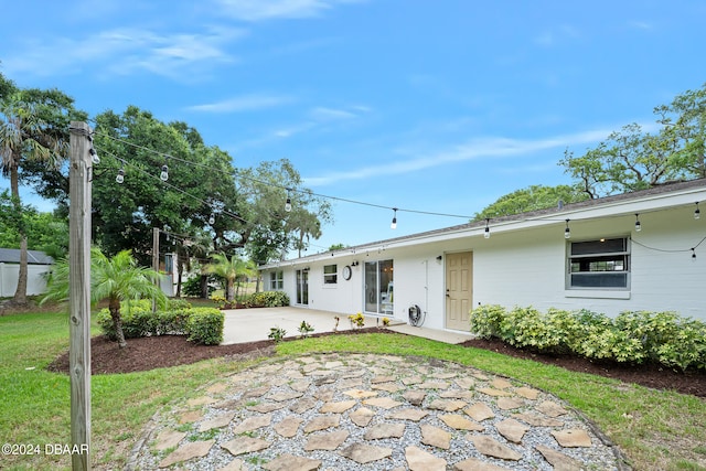 view of front of house with a patio