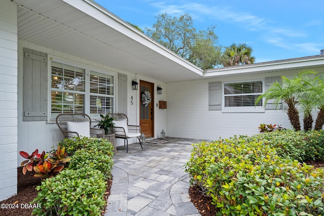 entrance to property with a porch