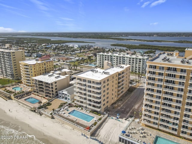 bird's eye view featuring a water view and a city view