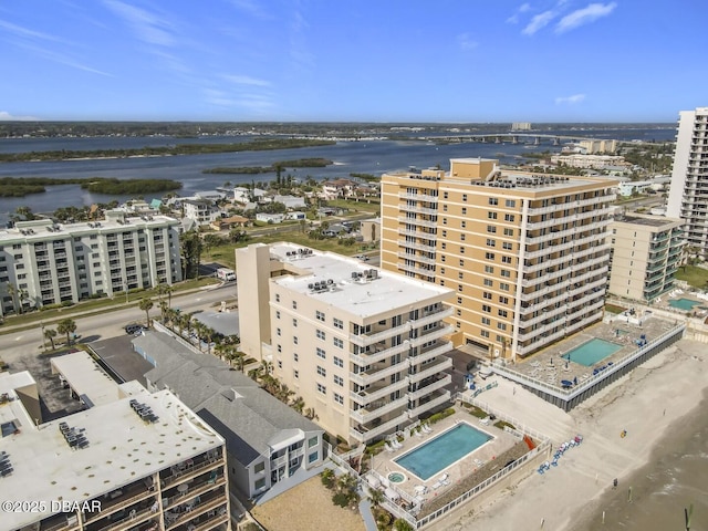 birds eye view of property with a view of city