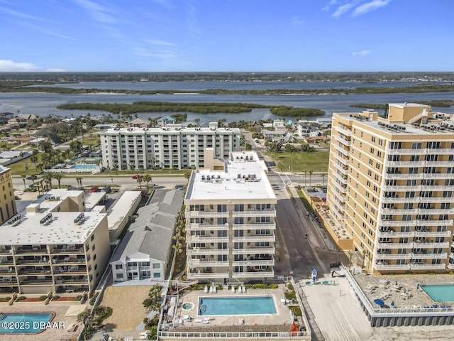 aerial view featuring a view of city and a water view