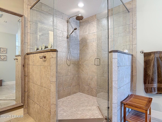 bathroom featuring a shower stall