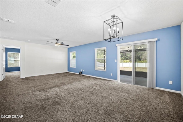 unfurnished living room featuring ceiling fan, a textured ceiling, and carpet