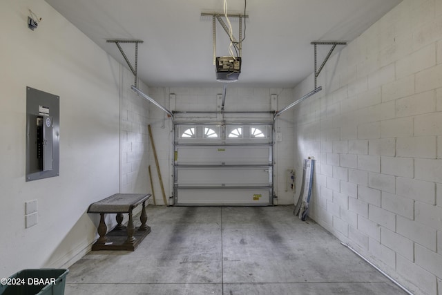 123 Langston Dr, Daytona Beach, FL 32124 - garage with electric panel and a garage door opener