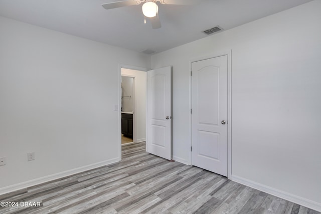 unfurnished bedroom with light hardwood / wood-style flooring and ceiling fan