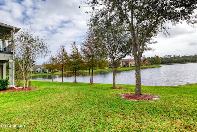 view of yard with a water view