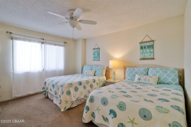 3855 S Atlantic Ave S Unit 1405, Daytona Beach, FL 32118 - carpeted bedroom featuring a textured ceiling and ceiling fan