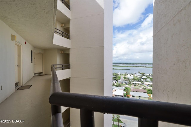 exterior space with a water view