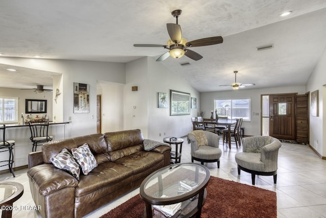 29 Concord Dr, Ormond Beach, FL 32176 - living room with vaulted ceiling, ceiling fan, plenty of natural light, light tile patterned floors, and recessed lighting