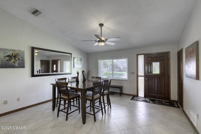 29 Concord Dr, Ormond Beach, FL 32176 - dining area featuring ceiling fan, vaulted ceiling, and light tile patterned flooring
