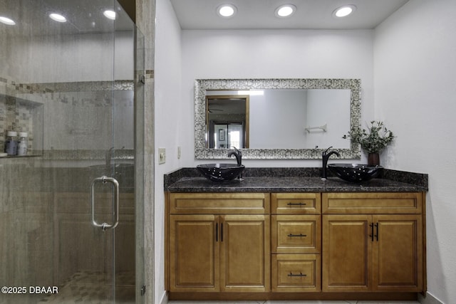 29 Concord Dr, Ormond Beach, FL 32176 - full bathroom with a shower stall, double vanity, and recessed lighting