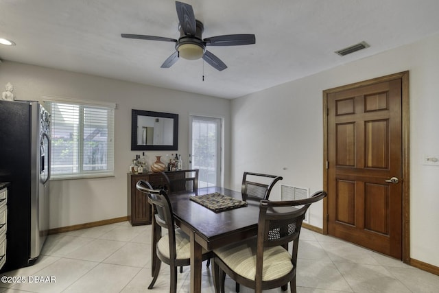 29 Concord Dr, Ormond Beach, FL 32176 - dining space featuring healthy amount of natural light, light tile patterned flooring, and ceiling fan
