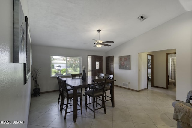 29 Concord Dr, Ormond Beach, FL 32176 - dining room with vaulted ceiling, ceiling fan, and light tile patterned floors