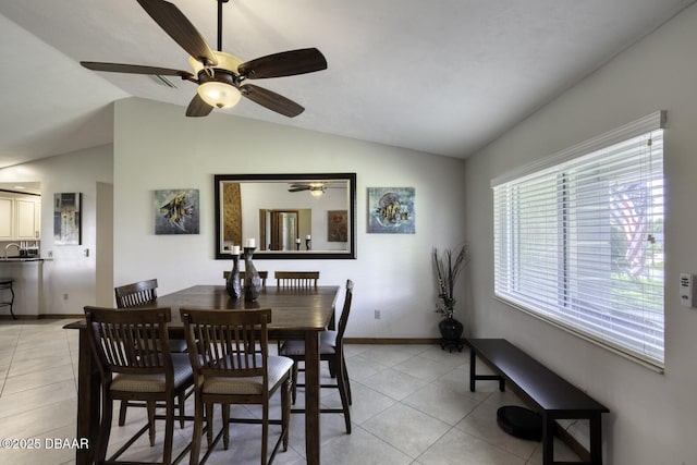29 Concord Dr, Ormond Beach, FL 32176 - dining room with light tile patterned flooring, lofted ceiling, and ceiling fan