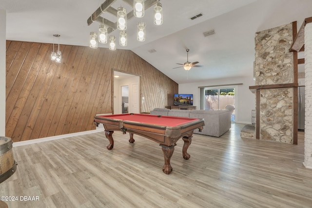 recreation room with pool table, light wood-type flooring, wooden walls, and vaulted ceiling