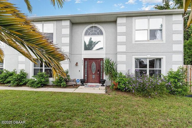 view of front of property featuring a front yard