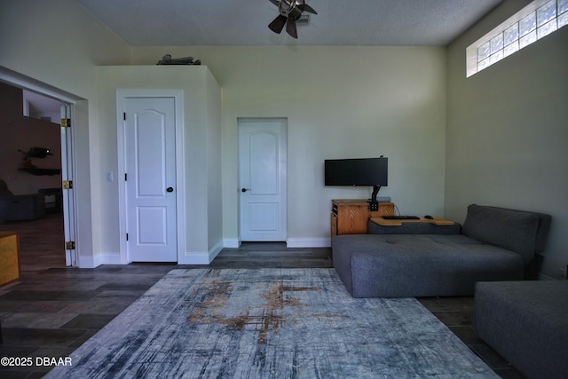 1948 Spruce Creek Lndg, Port Orange, FL 32128 - living area with a ceiling fan and baseboards