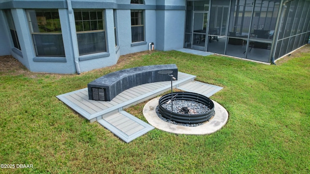 1948 Spruce Creek Lndg, Port Orange, FL 32128 - view of yard with an outdoor fire pit and a sunroom