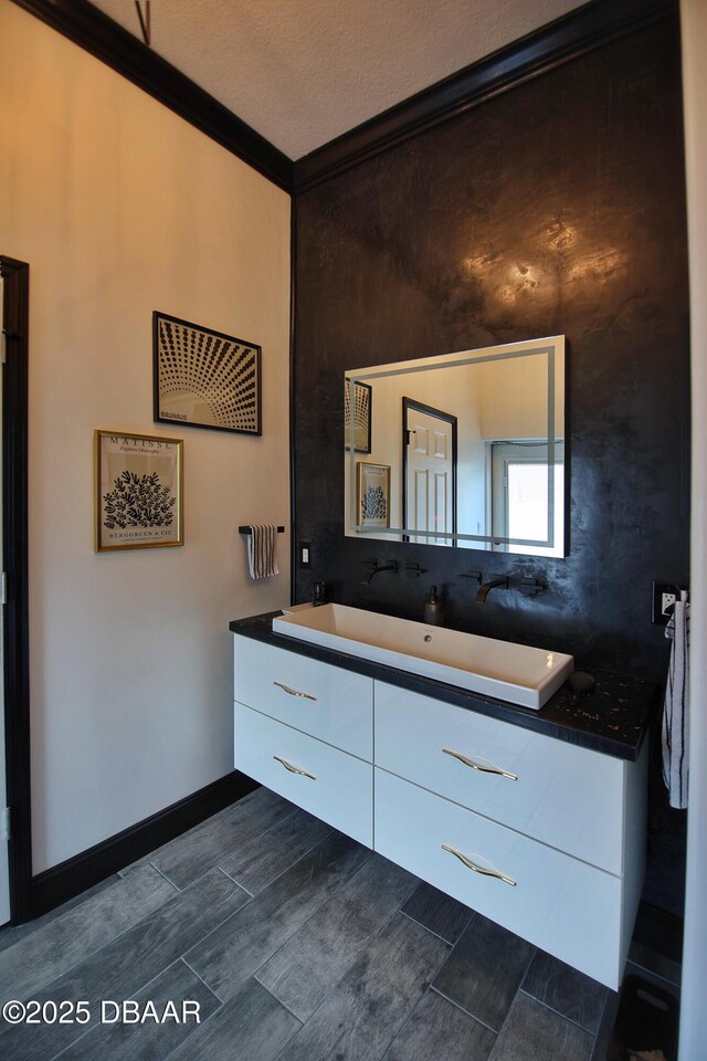 1948 Spruce Creek Lndg, Port Orange, FL 32128 - bathroom with vanity and crown molding