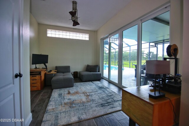 1948 Spruce Creek Lndg, Port Orange, FL 32128 - living room with dark wood-style floors and a ceiling fan