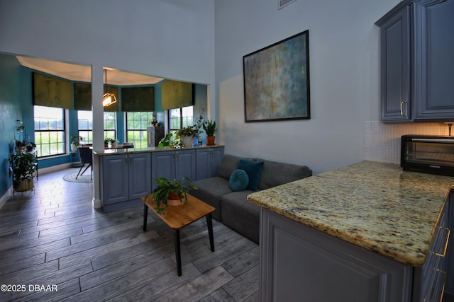 1948 Spruce Creek Lndg, Port Orange, FL 32128 - living area with a toaster and wood finished floors