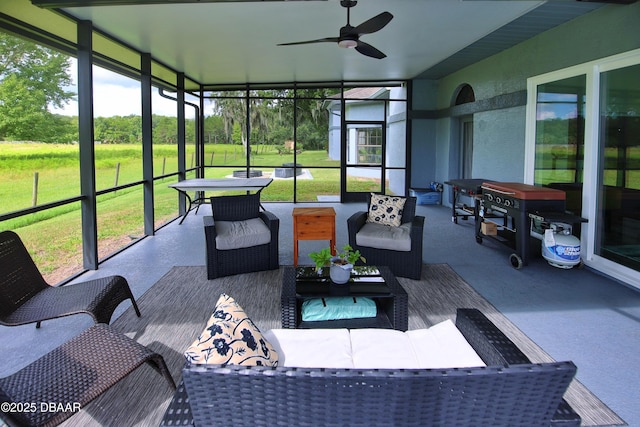 1948 Spruce Creek Lndg, Port Orange, FL 32128 - sunroom featuring an outdoor hangout area and ceiling fan