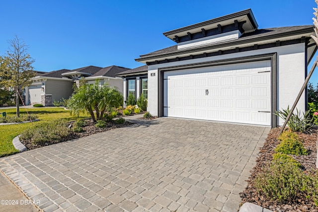 ranch-style house with a garage