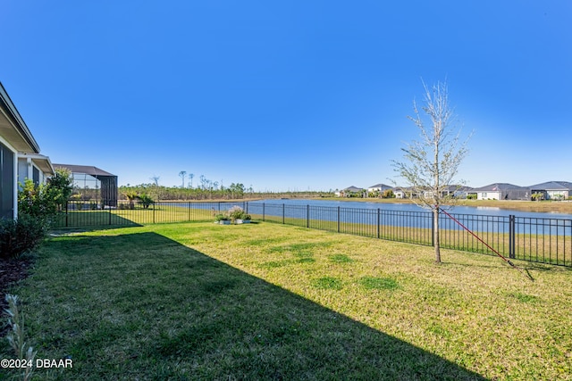 view of yard with a water view